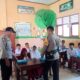 Polsek Madapangga Kawal Pemberian Makan Gratis Bergizi di Wilayah Kecamatan Madapangga