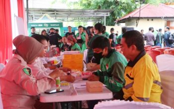 Pengemudi Ojol Senang, Dapat Pelayanan Kesehatan Gratis Hari Bhayangkara ke-79 Polda Sulut
