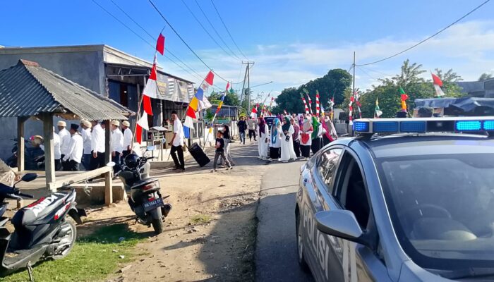 Polsek Poto Tano Amankan Pawai Ta’aruf STQ Ke-IX Tingkat Kecamatan Poto Tano Tahun 2025