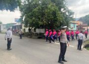 PENGAMANAN LOMBA GERAK JALAN TEPAT WAKTU DALAM RANGKA HARLAH KABUPATEN SUMBAWA BARAT KE-22