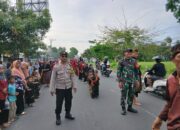 BHABINKAMTIBMAS DESA PENGENJEK LAKSANAKAN PENGAMANAN KEGIATAN NYONGKOLAN DI DESA NYEROT