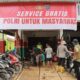 Bangkit Bersama Polri: Kapolres Tapteng Layani Service Motor Gratis untuk Warga Terdampak